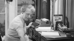 Helen Creighton at desk